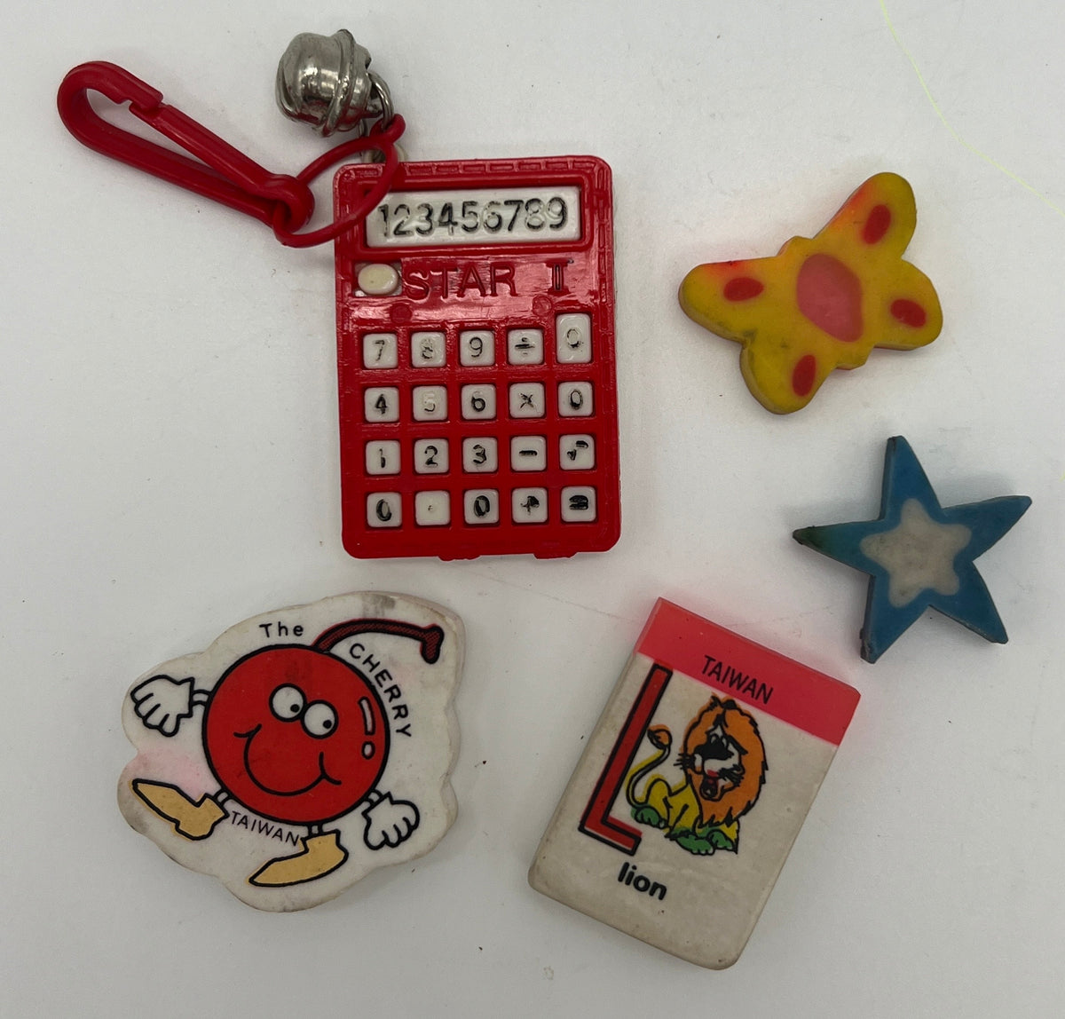 80s Bell calculator charm and mini eraser lot