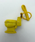 80s Yellow Toilet Charm – Missing Jingle Bell, Nostalgic Clip Accessory