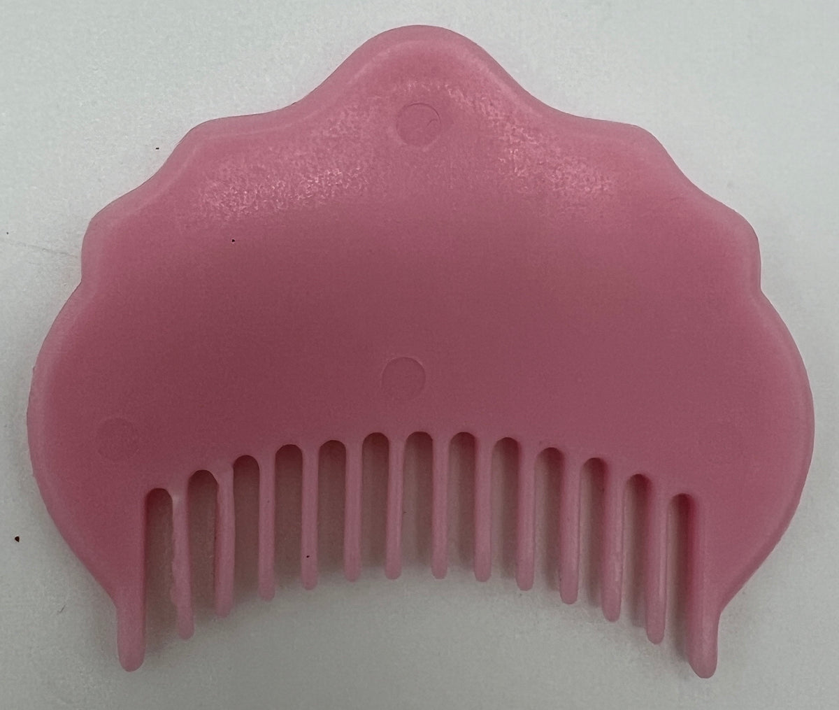 1991 Tyco Ideal Nursery baby doll comb