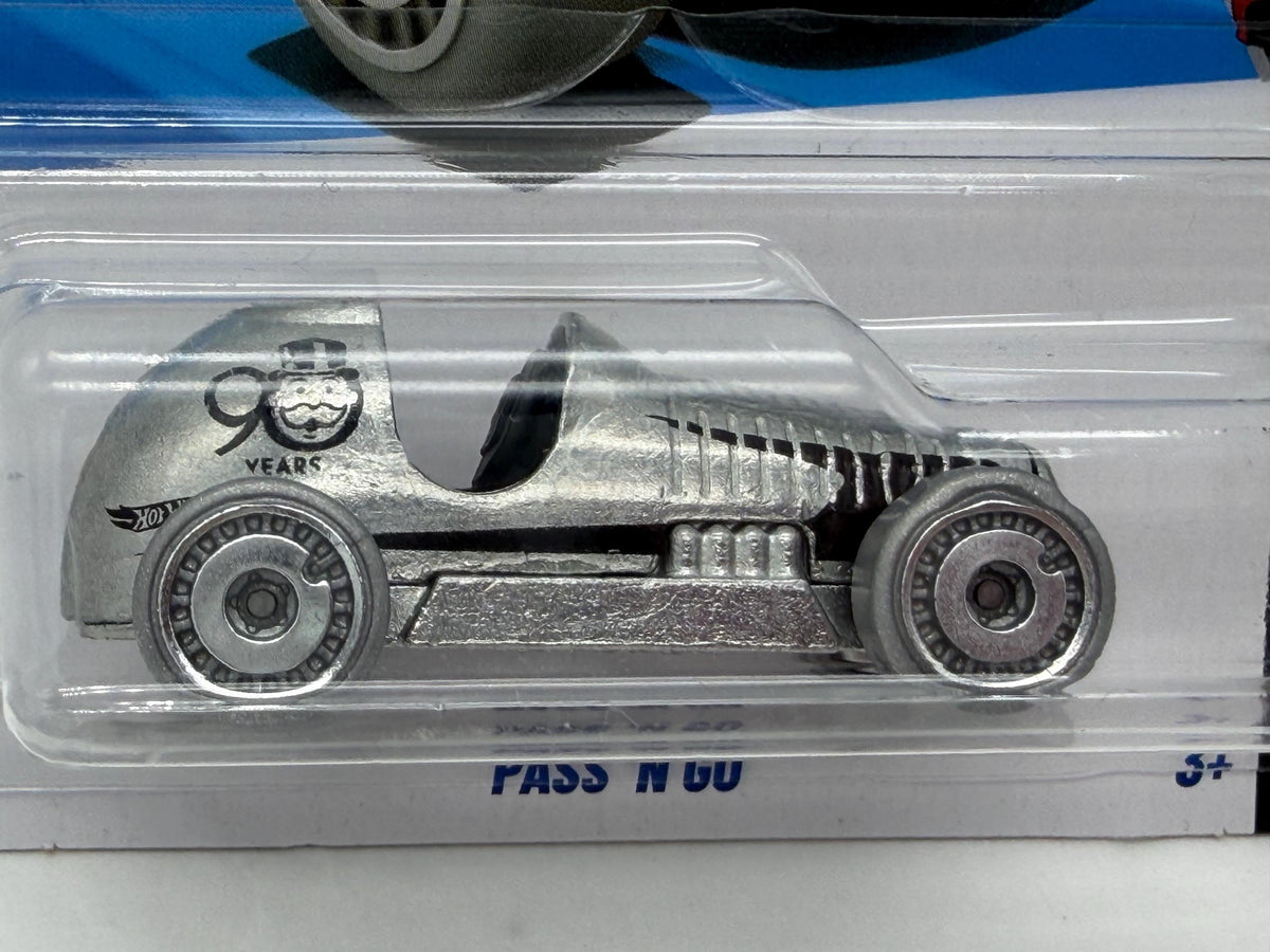 Monopoly 90th anniversary Pass ‘n Go Hot Wheels  die cast game piece car on card