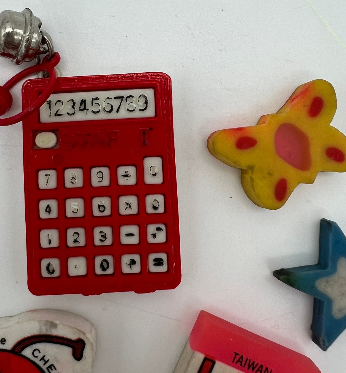 80s Bell calculator charm and mini eraser lot