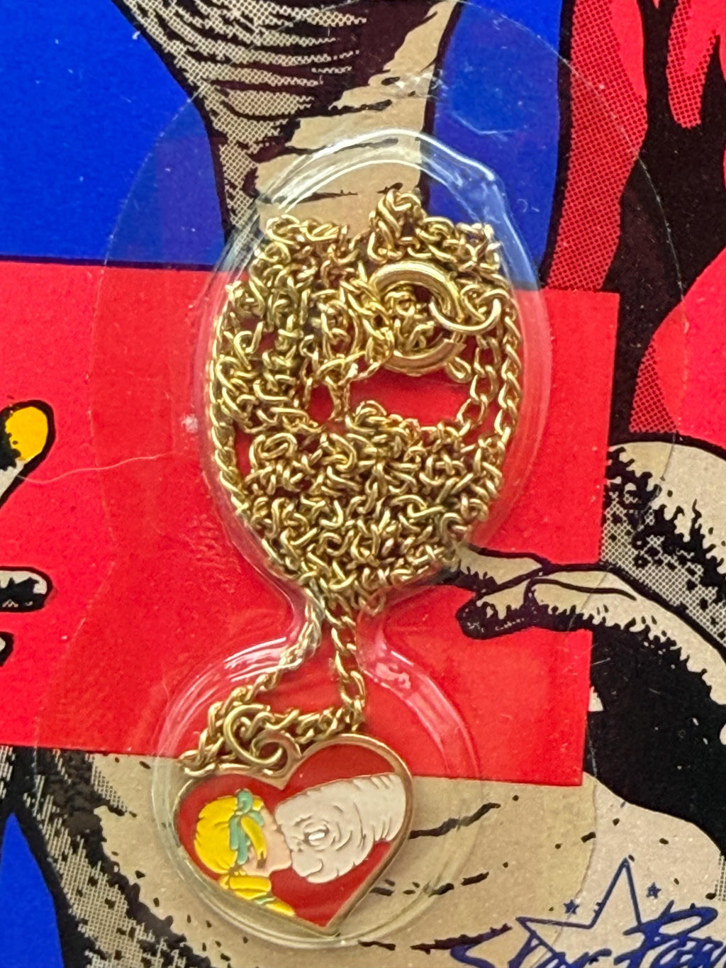 Vintage E.T. The Extraterrestrial child’s charm necklace on card