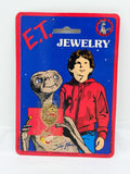 Vintage E.T. The Extraterrestrial child’s charm necklace on card