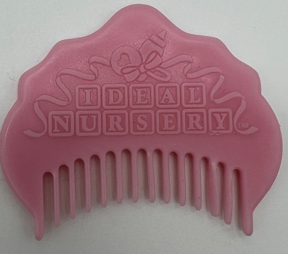 1991 Tyco Ideal Nursery baby doll comb